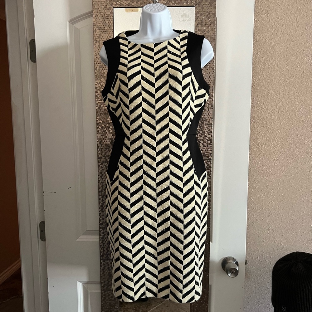 Cream color and black tailored dress
